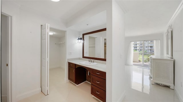 1 John Anderson Dr Unit 2180, Ormond Beach, FL 32176 - bathroom with vanity, baseboards, and tile patterned flooring