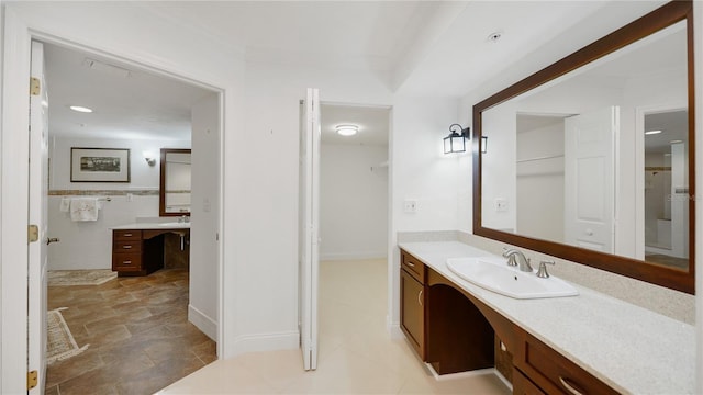 1 John Anderson Dr Unit 2180, Ormond Beach, FL 32176 - bathroom featuring vanity and stone finish floors