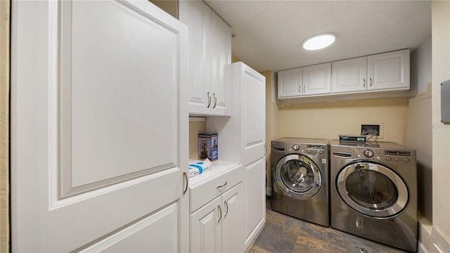 1 John Anderson Dr Unit 2180, Ormond Beach, FL 32176 - laundry room featuring separate washer and dryer, cabinet space, and stone finish floors