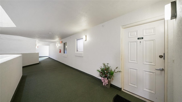 1 John Anderson Dr Unit 2180, Ormond Beach, FL 32176 - corridor with dark colored carpet