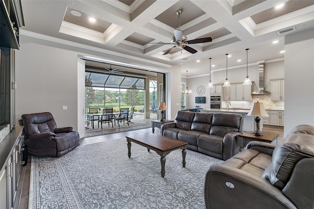 514 Wingspan Dr, Ormond Beach, FL 32174 - living area with ceiling fan, coffered ceiling, ornamental molding, and beamed ceiling