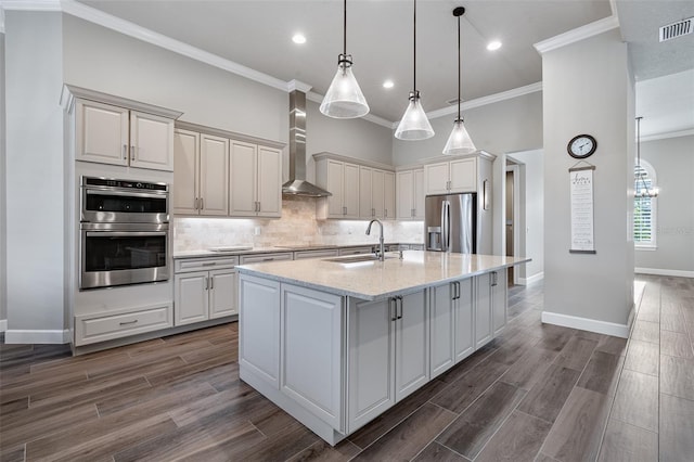 514 Wingspan Dr, Ormond Beach, FL 32174 - kitchen featuring stainless steel appliances, wall chimney range hood, crown molding, tasteful backsplash, and a sink