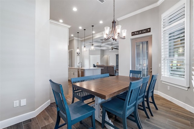 514 Wingspan Dr, Ormond Beach, FL 32174 - dining space with ornamental molding, recessed lighting, baseboards, a chandelier, and a ceiling fan
