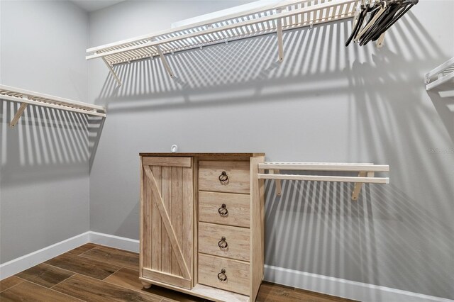 514 Wingspan Dr, Ormond Beach, FL 32174 - walk in closet with dark wood finished floors
