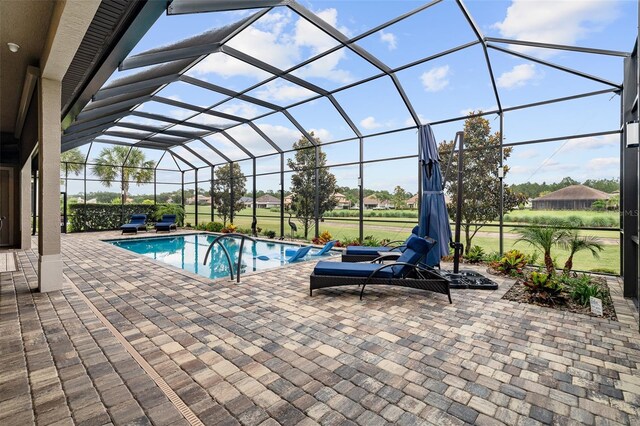 514 Wingspan Dr, Ormond Beach, FL 32174 - swimming pool featuring a patio area and a lanai