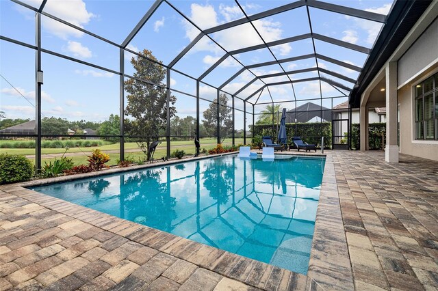 514 Wingspan Dr, Ormond Beach, FL 32174 - outdoor pool featuring a patio and a lanai
