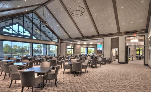 514 Wingspan Dr, Ormond Beach, FL 32174 - community lobby with high vaulted ceiling and beamed ceiling