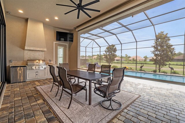 514 Wingspan Dr, Ormond Beach, FL 32174 - view of patio / terrace featuring ceiling fan, an outdoor pool, outdoor dining area, and a lanai