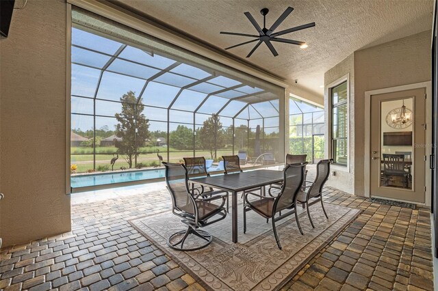 514 Wingspan Dr, Ormond Beach, FL 32174 - view of patio with an outdoor pool, a ceiling fan, a lanai, and outdoor dining space