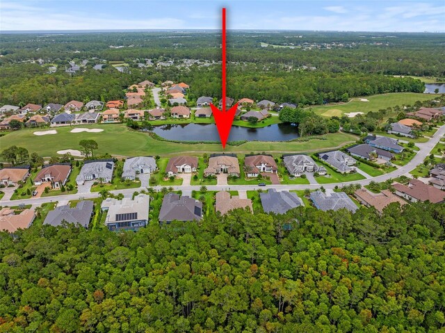 514 Wingspan Dr, Ormond Beach, FL 32174 - aerial view of property's location with a nearby body of water, nearby suburban area, and a local golf course