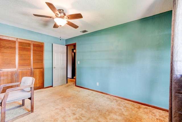 35 Whippoorwill Ln, Ormond Beach, FL 32174 - unfurnished office with ceiling fan, carpet, baseboards, and a textured ceiling