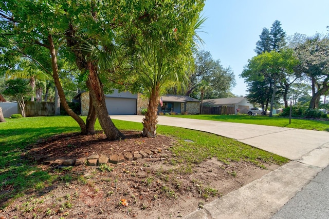 35 Whippoorwill Ln, Ormond Beach, FL 32174 - view of front of property with driveway and a garage