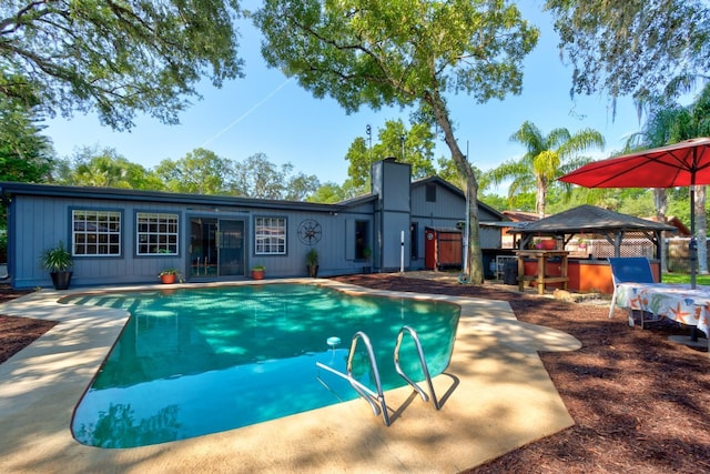 35 Whippoorwill Ln, Ormond Beach, FL 32174 - swimming pool featuring a gazebo and a patio area