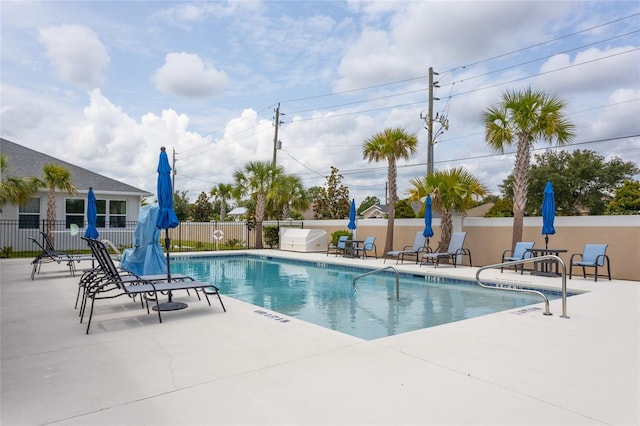 11 Tideway Trl, Palm Coast, FL 32137 - community pool featuring a patio area