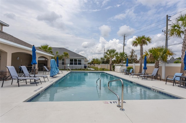 11 Tideway Trl, Palm Coast, FL 32137 - community pool featuring a patio