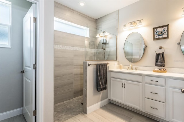 11 Tideway Trl, Palm Coast, FL 32137 - full bath with vanity, walk in shower, baseboards, and recessed lighting