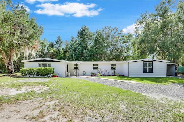 443 Polk Ave, Orange Park, FL 32065 - view of front of property featuring a front yard and view of wooded area