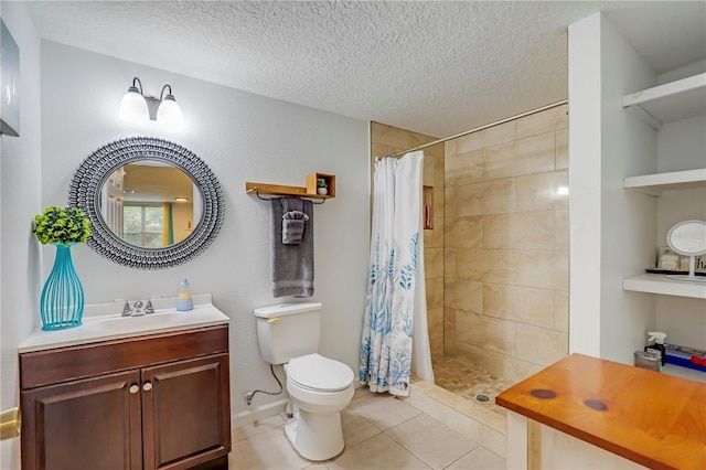 443 Polk Ave, Orange Park, FL 32065 - full bath with vanity, a tile shower, tile patterned flooring, toilet, and a textured ceiling