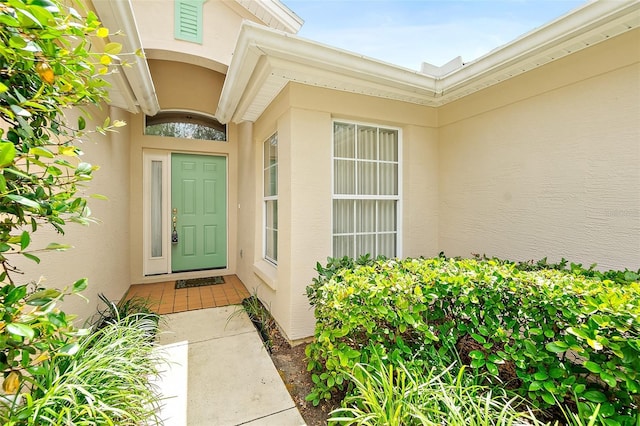 10 Chatham Pl Unit 10, Palm Coast, FL 32164 - view of exterior entry with stucco siding