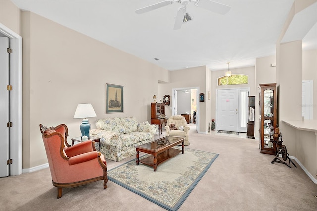 10 Chatham Pl Unit 10, Palm Coast, FL 32164 - living area featuring carpet, a ceiling fan, and baseboards