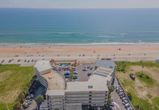1233 S Atlantic Ave Unit 3070, Daytona Beach, FL 32118 - aerial view of property and surrounding area featuring waterfront with a beach