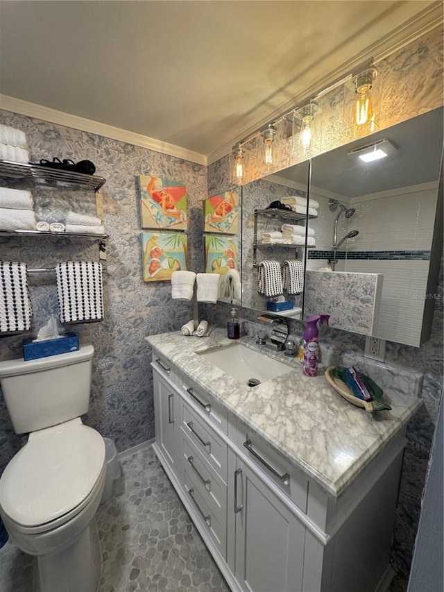 1233 S Atlantic Ave Unit 3070, Daytona Beach, FL 32118 - bathroom featuring vanity, toilet, and ornamental molding