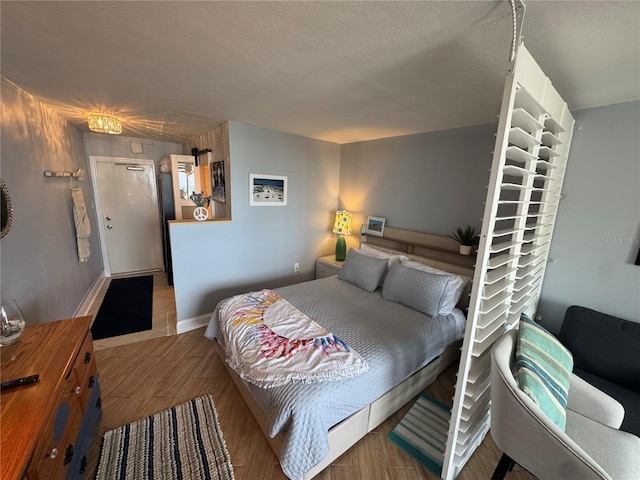 1233 S Atlantic Ave Unit 3070, Daytona Beach, FL 32118 - bedroom featuring wood finished floors