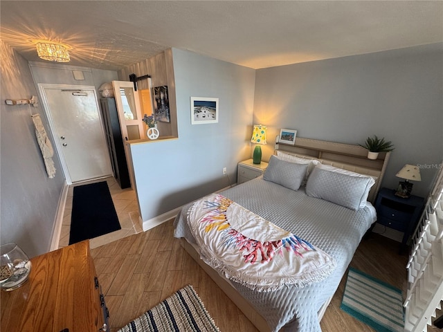 1233 S Atlantic Ave Unit 3070, Daytona Beach, FL 32118 - bedroom with wood finished floors