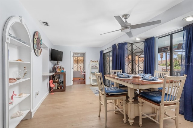 30 Clermont Ct, Palm Coast, FL 32137 - dining room with light wood-style flooring, ceiling fan, and baseboards