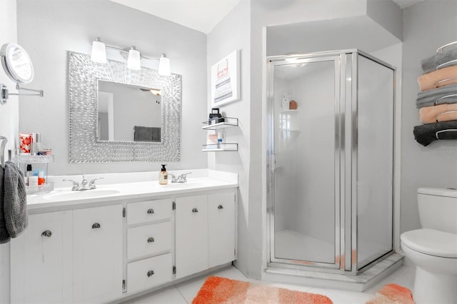 30 Clermont Ct, Palm Coast, FL 32137 - full bathroom featuring toilet, a shower stall, double vanity, and tile patterned floors