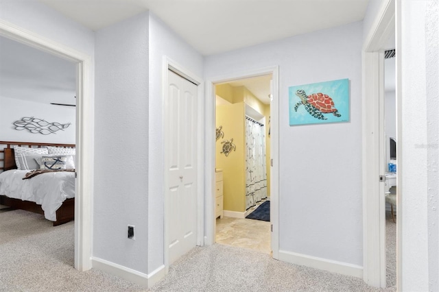 30 Clermont Ct, Palm Coast, FL 32137 - hallway featuring carpet flooring and baseboards