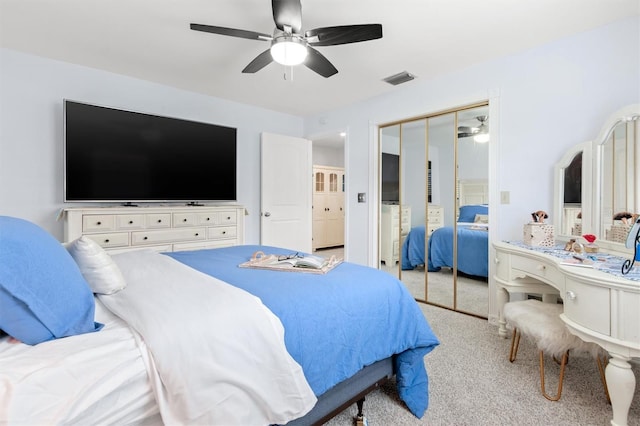 30 Clermont Ct, Palm Coast, FL 32137 - bedroom featuring carpet, a closet, and a ceiling fan