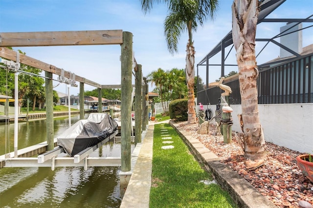 30 Clermont Ct, Palm Coast, FL 32137 - dock featuring boat lift, a water view, and glass enclosure