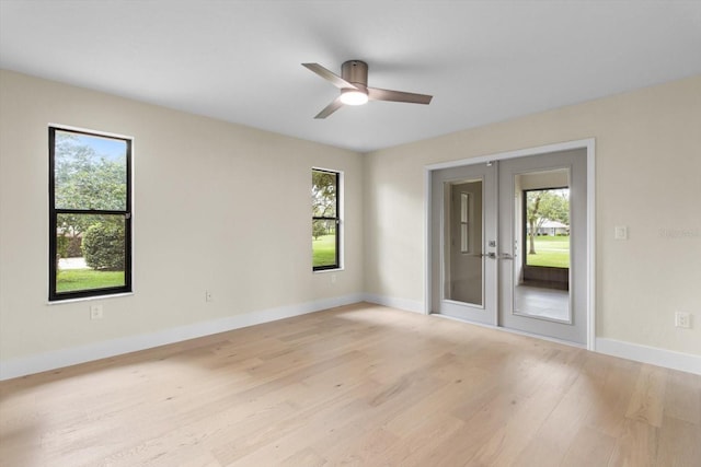 381 E Joplin Ct, Hernando, FL 34442 - unfurnished room featuring french doors, light wood-style flooring, and plenty of natural light