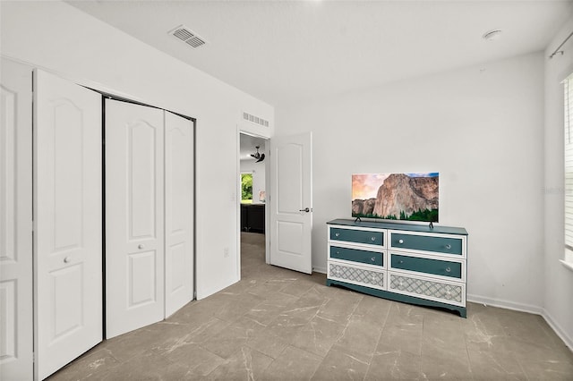24 Beacon Mill Ln, Palm Coast, FL 32137 - bedroom featuring a closet and baseboards