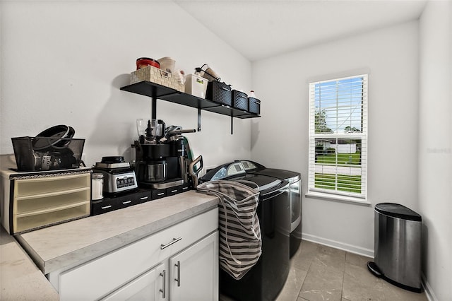 24 Beacon Mill Ln, Palm Coast, FL 32137 - washroom featuring washer and clothes dryer, baseboards, and light tile patterned flooring