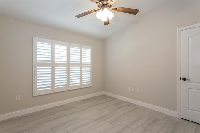 127 Wynnfield Dr, Palm Coast, FL 32164 - spare room with a ceiling fan and baseboards