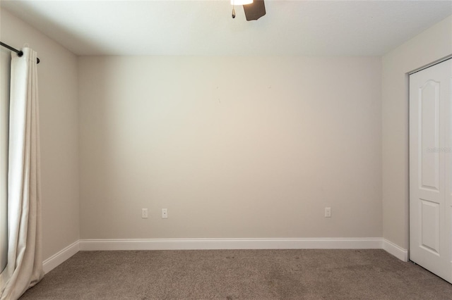 127 Wynnfield Dr, Palm Coast, FL 32164 - spare room featuring light colored carpet, baseboards, and a ceiling fan
