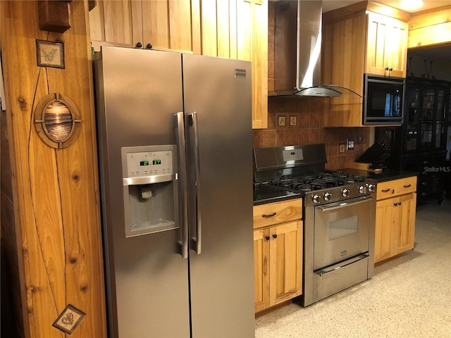 33 Camellia Dr, Ormond Beach, FL 32176 - kitchen with stainless steel appliances, wall chimney exhaust hood, dark countertops, and tasteful backsplash