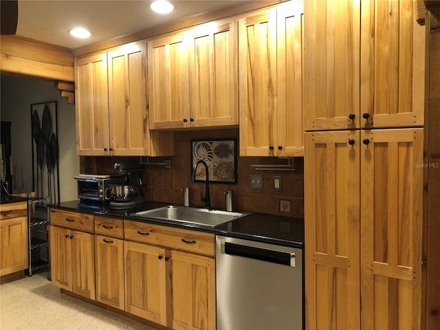 33 Camellia Dr, Ormond Beach, FL 32176 - kitchen with stainless steel dishwasher, a sink, dark countertops, backsplash, and recessed lighting