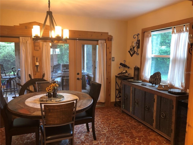 33 Camellia Dr, Ormond Beach, FL 32176 - dining space with a chandelier