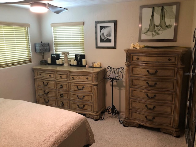 33 Camellia Dr, Ormond Beach, FL 32176 - bedroom with light colored carpet and ceiling fan