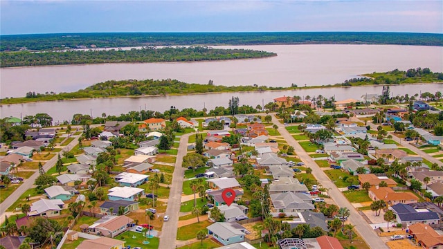 33 Camellia Dr, Ormond Beach, FL 32176 - aerial view of residential area with a large body of water