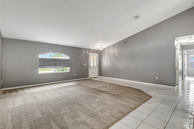 88 Pritchard Dr, Palm Coast, FL 32164 - unfurnished room featuring healthy amount of natural light and tile patterned floors