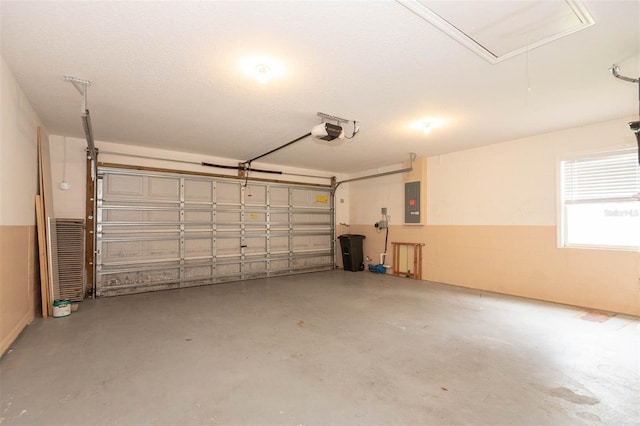 88 Pritchard Dr, Palm Coast, FL 32164 - garage with a garage door opener and electric panel