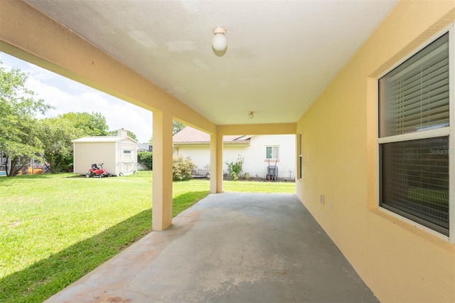 88 Pritchard Dr, Palm Coast, FL 32164 - view of patio / terrace with an outbuilding