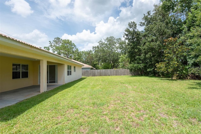 88 Pritchard Dr, Palm Coast, FL 32164 - view of yard featuring a patio area