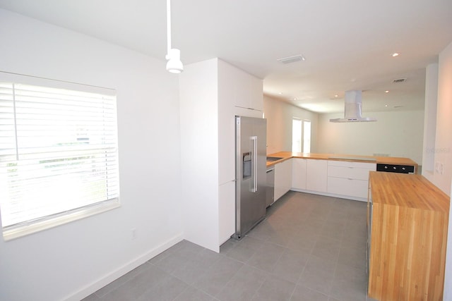 19 Cedarfield Ct, Palm Coast, FL 32137 - kitchen featuring island range hood, appliances with stainless steel finishes, wood counters, modern cabinets, and white cabinets