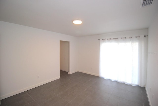 19 Cedarfield Ct, Palm Coast, FL 32137 - spare room with baseboards
