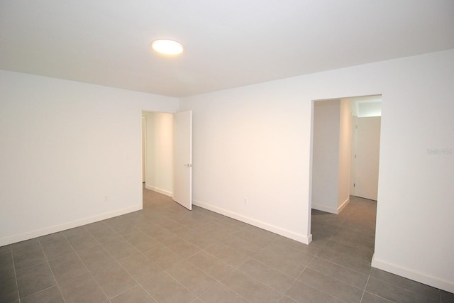 19 Cedarfield Ct, Palm Coast, FL 32137 - spare room featuring baseboards